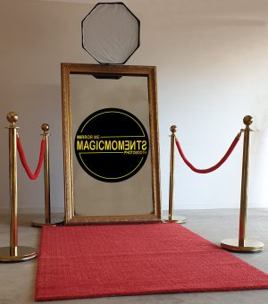 red carpet and gold bollards
